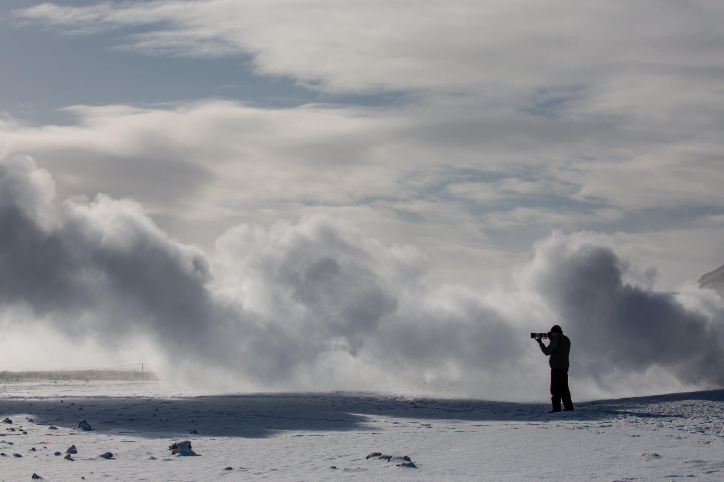 Fotograf im Geothermalgebiet Krafla
