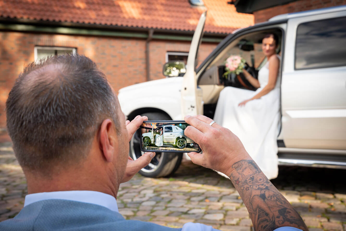 Handyfoto von der Braut