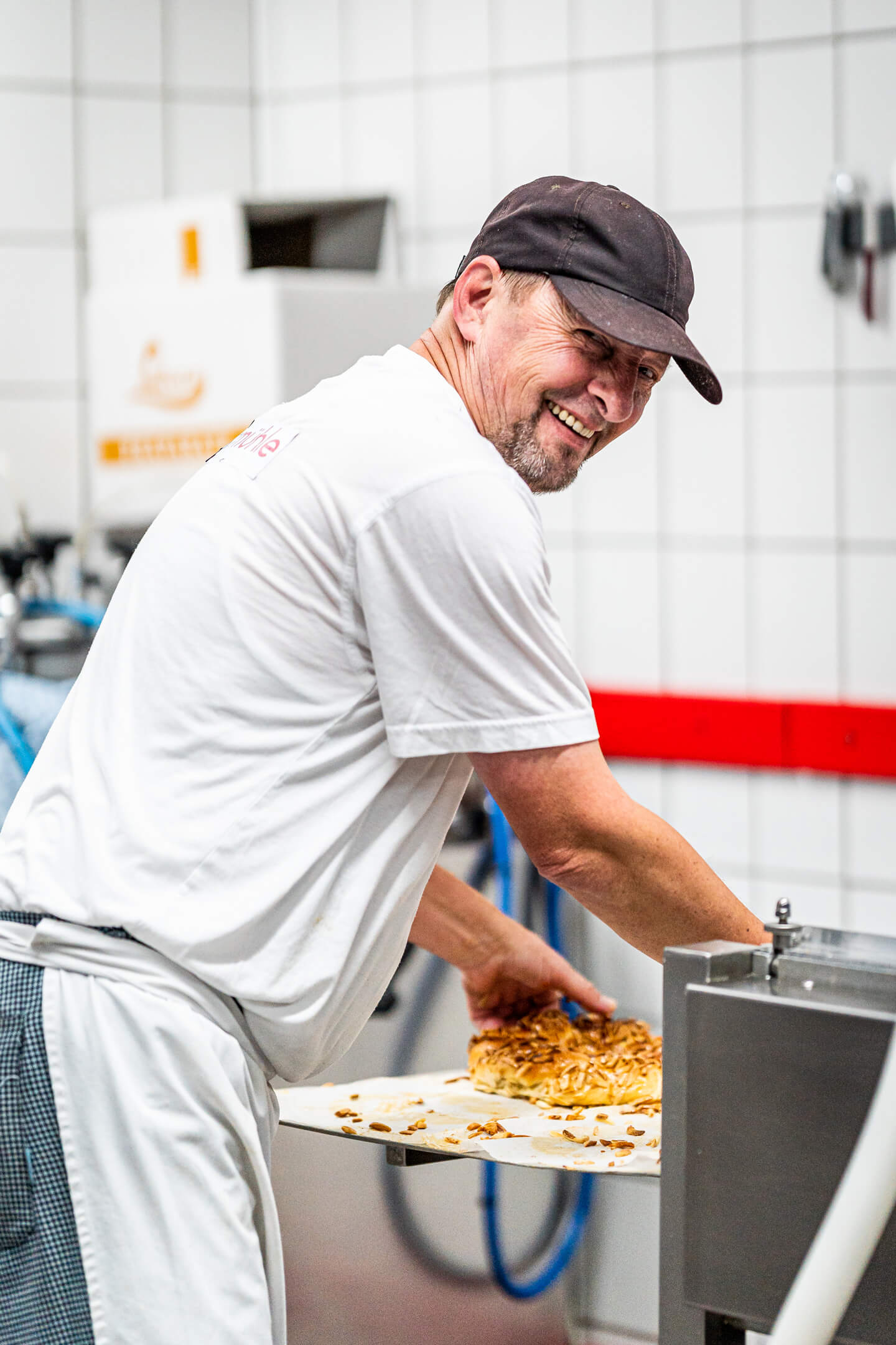 Unternehmensfotografie: Bäcker bei der Arbeit.